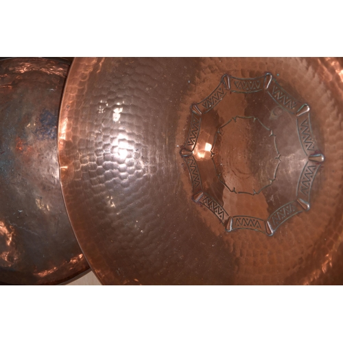 458 - TWO HAND BEATEN ARTS & CRAFTS COPPER DISHES, comprising a L.R.I. (Lakeland Rural Industries), Borrow... 