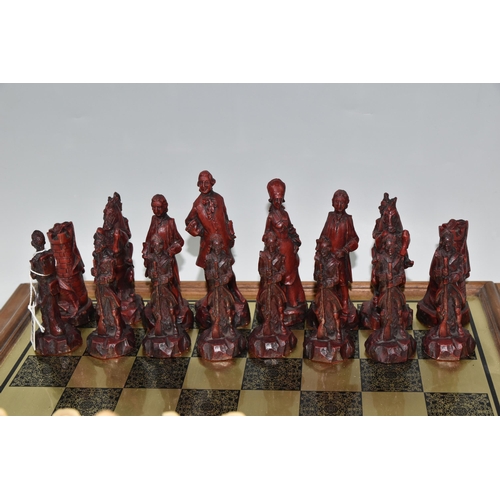 469 - AN AMERICAN WAR OF INDEPENDENCE THEMED RESIN CHESS SET, all pieces appear in fairly good condition w... 