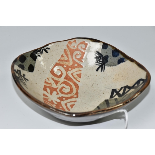 470 - JOHN MALTBY (BRITISH 1936-2020) A SHAPED SQUARE STONEWARE BOWL, decorated with stylised trees, field... 