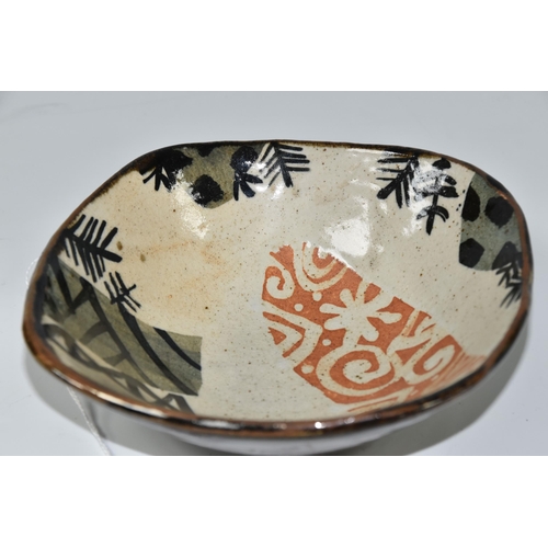 470 - JOHN MALTBY (BRITISH 1936-2020) A SHAPED SQUARE STONEWARE BOWL, decorated with stylised trees, field... 