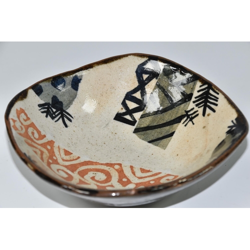 470 - JOHN MALTBY (BRITISH 1936-2020) A SHAPED SQUARE STONEWARE BOWL, decorated with stylised trees, field... 