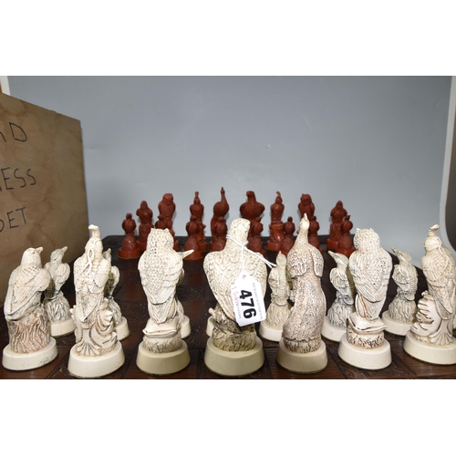 476 - A BIRD THEMED RESIN CHESS SET, all the pieces formed as birds, several with minor damage and old rep... 