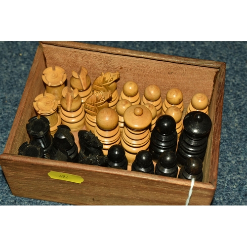 492 - WOODEN CHESS PIECES AND WOODEN BOX, wooden box with gold coloured metal detailed inlay, has the key ... 