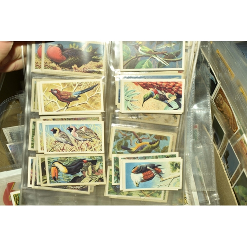 512 - TWO BOXES OF POSTCARDS & CIGARETTE CARDS each containing over 1000 examples, the postcards are mainl... 