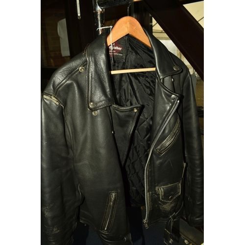 519 - ONE BOX OF MOTORCYCLE GLOVES, TWO LEATHER JACKETS AND A PAIR OF BLACK LEATHER TROUSERS, waist size 3... 