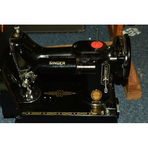 520 - TWO BOXES AND LOOSE SEWING ITEMS AND ACCESSORIES, included a vintage Singer Portable electric sewing... 