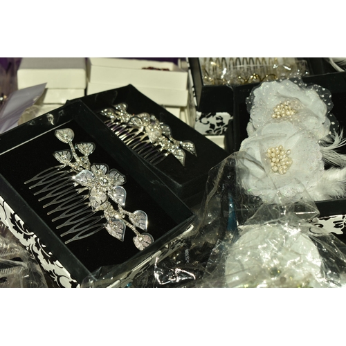 534 - FIVE BOXES OF HAIR ACCESSORIES, to include wedding hair decorations diamante grips, clips and combs,... 