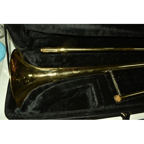 535 - A CASED BRASS JOHN PACKER TROMBONE, stamped JP 031, in a contemporary fitted John Packer travelling ... 