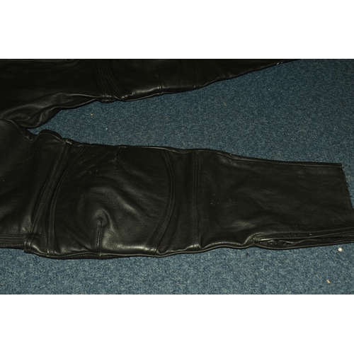 553 - A SET OF MEN'S MOTORBIKE LEATHERS, comprising a pair of 'TT Leathers' black leather trousers, UK siz... 