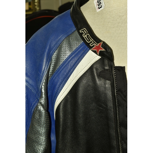 553 - A SET OF MEN'S MOTORBIKE LEATHERS, comprising a pair of 'TT Leathers' black leather trousers, UK siz... 