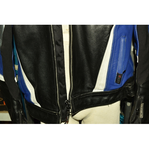 553 - A SET OF MEN'S MOTORBIKE LEATHERS, comprising a pair of 'TT Leathers' black leather trousers, UK siz... 