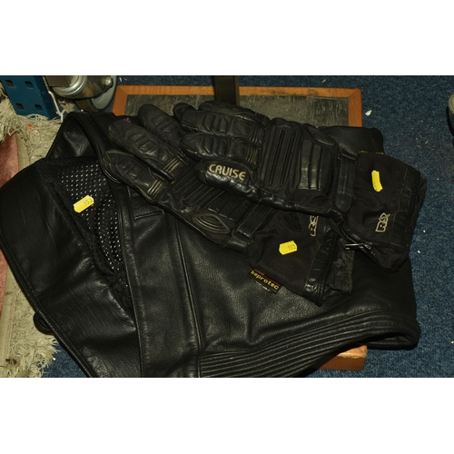 553 - A SET OF MEN'S MOTORBIKE LEATHERS, comprising a pair of 'TT Leathers' black leather trousers, UK siz... 