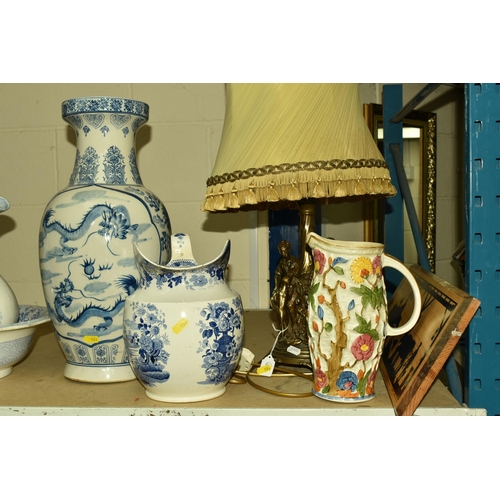 554 - A COLLECTION OF CERAMICS AND TABLE LAMPS, comprising a large blue and white Oriental vase decorated ... 