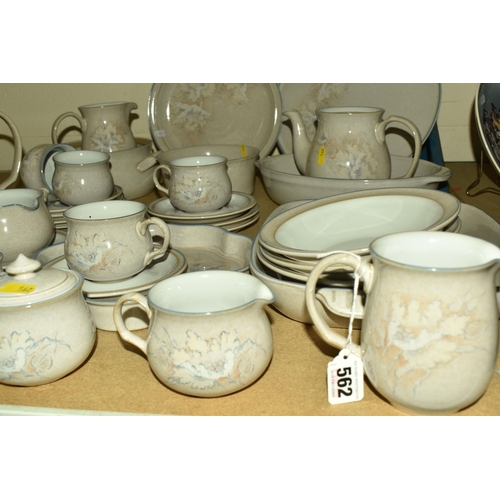 562 - A QUANTITY OF DENBY 'TASMIN' PATTERN DINNERWARE, comprising a coffee pot, teapot (missing lid), four... 