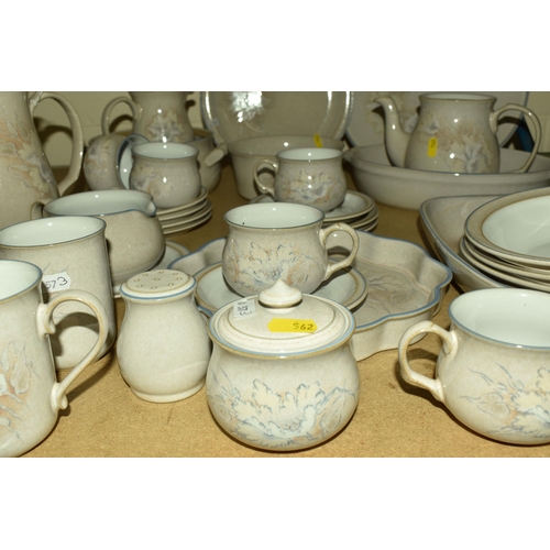 562 - A QUANTITY OF DENBY 'TASMIN' PATTERN DINNERWARE, comprising a coffee pot, teapot (missing lid), four... 