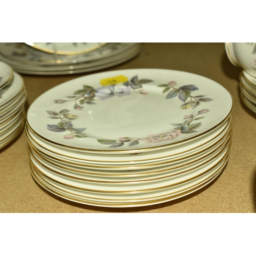 570 - A COLLECTION OF ROYAL WORCESTER ' JUNE GARLAND ' DINNERWARE, comprising of five dinner plates, two c... 