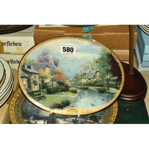 580 - A LARGE QUANTITY OF BOXED COLLECTOR'S PLATES, comprising two boxed Wedgwood Daily Mail calendar plat... 