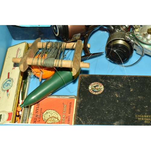 584 - A BOX AND LOOSE FISHING EQUIPMENT, to include an unmarked fishing rod, and three unmarked rods with ... 