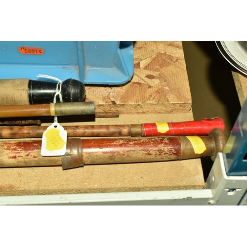 584 - A BOX AND LOOSE FISHING EQUIPMENT, to include an unmarked fishing rod, and three unmarked rods with ... 