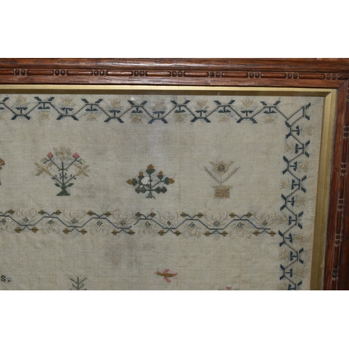 599 - A GEORGIAN WILLIAM IV NEEDLEWORK SAMPLER, worked by 'Ann Johnson Aged 13 Years, December 10th 1833',... 