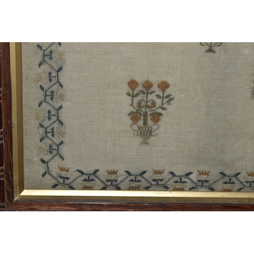 599 - A GEORGIAN WILLIAM IV NEEDLEWORK SAMPLER, worked by 'Ann Johnson Aged 13 Years, December 10th 1833',... 