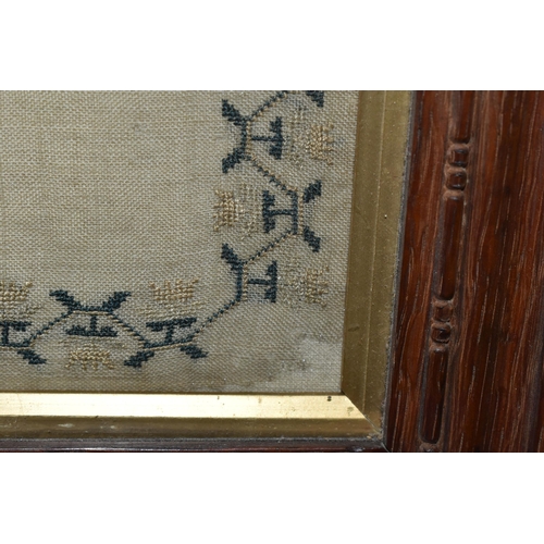 599 - A GEORGIAN WILLIAM IV NEEDLEWORK SAMPLER, worked by 'Ann Johnson Aged 13 Years, December 10th 1833',... 