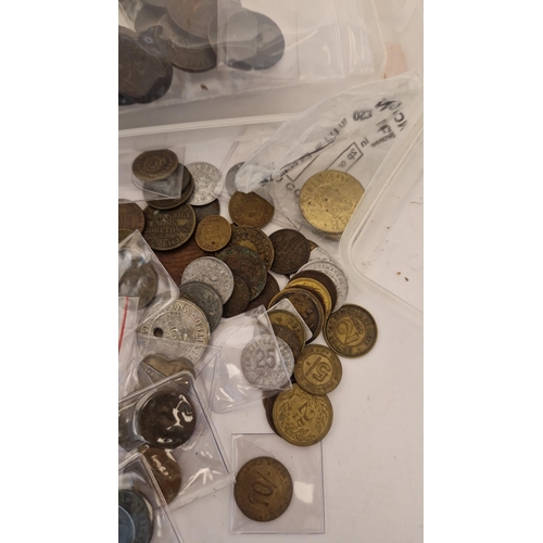 125 - A PLASIC TUB CONTAINING CHECKS TOKENS AND MEDALS All Assocated with the Co-op Wholesale Society Toke... 