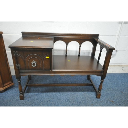 1204 - A 20TH CENTURY OAK BUREAU, the fall front door enclosing a fitted interior, above four drawers, widt... 