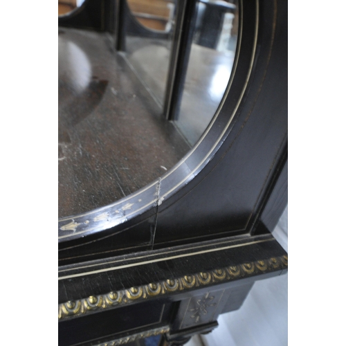 1209 - A NAPOLEON III EBONISE MIRROR BACK SIDE TABLE, the raised back with three small and one long shelf, ... 