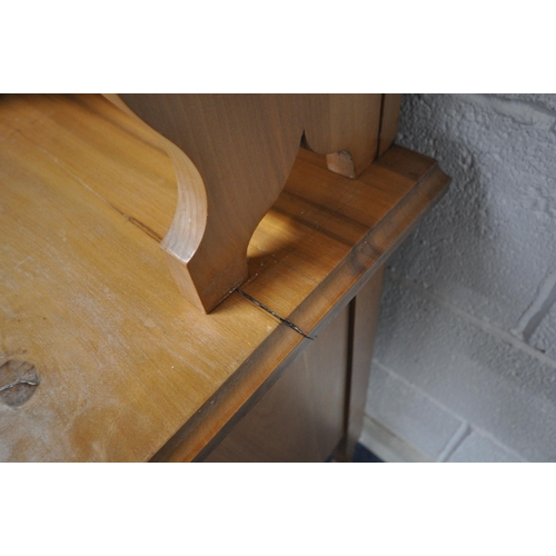 1215 - AN EDWARDIAN SATINWOOD DRESSING TABLE, with a triple bevelled edge mirror, atop a base with two shor... 