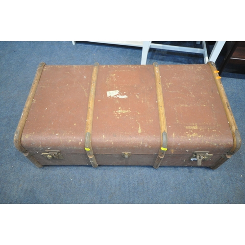 1228 - A VINTAGE CANVASS TRAVELING TRUNK, with wooden banding, a two tier trolley, a chair and a small book... 