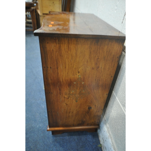 1229 - A HARDWOOD CABINET, with a serpentine front, brass inlay, fitted with four drawers and a single cupb... 