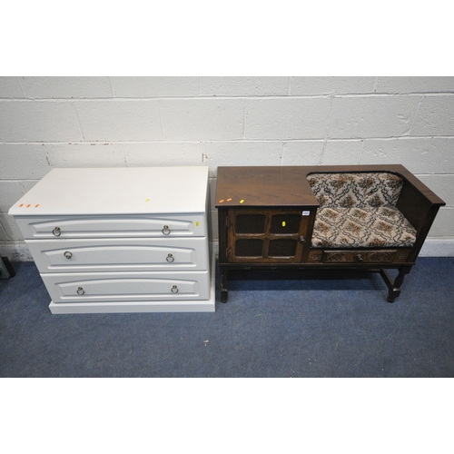 1231 - A 20TH CENTURY OAK TELEPHONE TABLE, fitted with a single drawer and cupboard doors, raised on turned... 