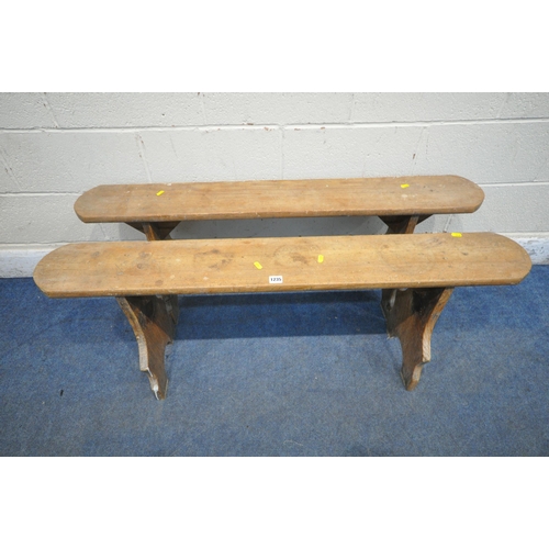 1235 - A PAIR OF PINE BENCHES, raised on trestle legs, length 124cm x depth 28cm x height 48cm (condition r... 