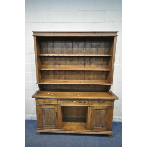 1237 - A 19TH CENTURY PINE DRESSER, the three tier plate rack atop a base with three drawers, above two cup... 