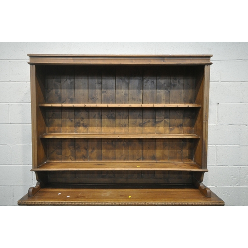 1237 - A 19TH CENTURY PINE DRESSER, the three tier plate rack atop a base with three drawers, above two cup... 