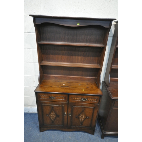 1243 - A STAG MINSTREL DRESSER, the two tier plate rack, atop a base with three drawers, above three cupboa... 