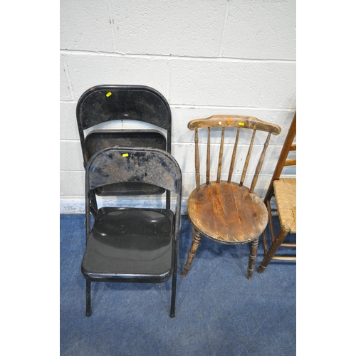 1251 - TWO 20TH CENTURY OAK LADDER BACK CHAIRS, with rush seats, a chair with a circular seat, along with a... 