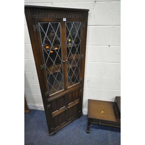 1274 - A 20TH CENTURY OAK CORNER CUPBOARD, with double lead glazed doors, above double cupboard doors, widt... 