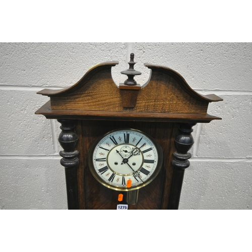 1275 - A 20TH CENTURY WALL CLOCK, the glass door enclosing an 8 inch brass and enamel dial, depicting Roman... 