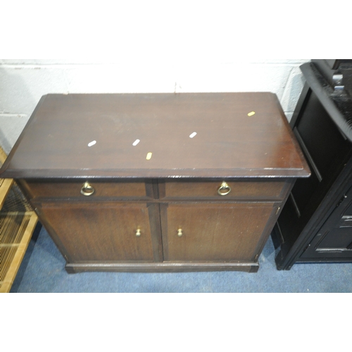 1283 - A 20TH CENTURY OAK DRESSER, the arched two tier plate rack, atop a base with two drawers and double ... 