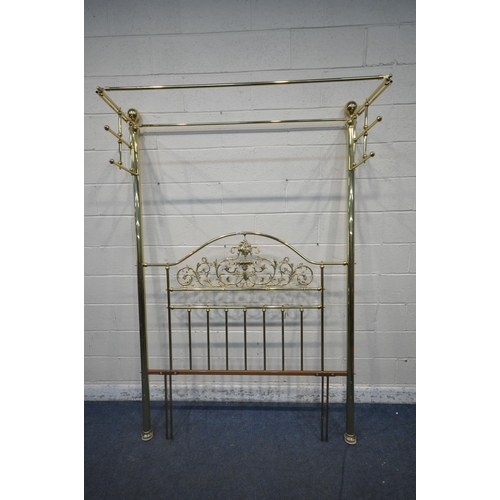 1289 - A BRASS 4FT6 HALF TESTER BED, with twin finials, drape holders, scrolled and foliate details (condit... 