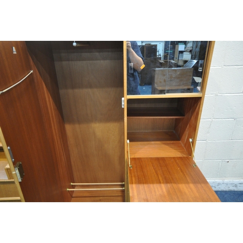 1290 - A MID CENTURY AVALON GENTLEMANS WARDROBE, fitted with a single door, two sliding mirror doors, a fal... 