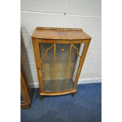 1292 - A 20TH CENTURY CABINET, with two glass doors, flanking a fall front door, that's enclosing a fitted ... 