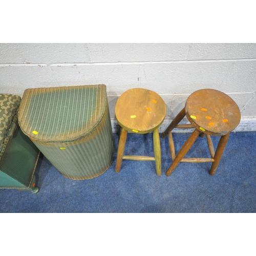 1293 - A GREEN PAINTED WICKER OTTOMAN, a Lloyd Loom linen basket, along with two stools (condition report: ... 