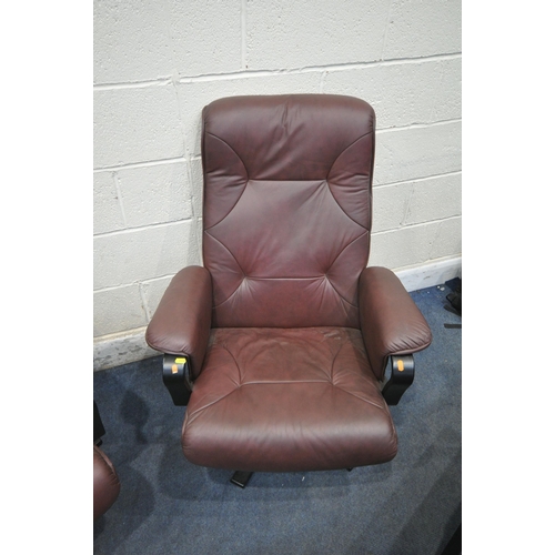 1318 - A PAIR OF IKEA PLUM LEATHERETTE RECLINING ARMCHAIRS, along with a matching footstool (condition repo... 