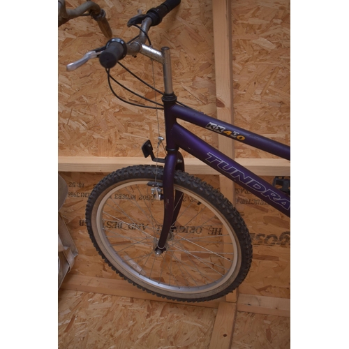 1014 - A TUNDRA KX400 LADIES BIKE, with grip shift gears and 23   frame