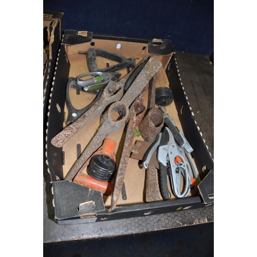 1057 - FOUR TRAYS CONTAINING VINTAGE TOOLS including thread gauges, tap holders, pick axe heads, secateurs,... 