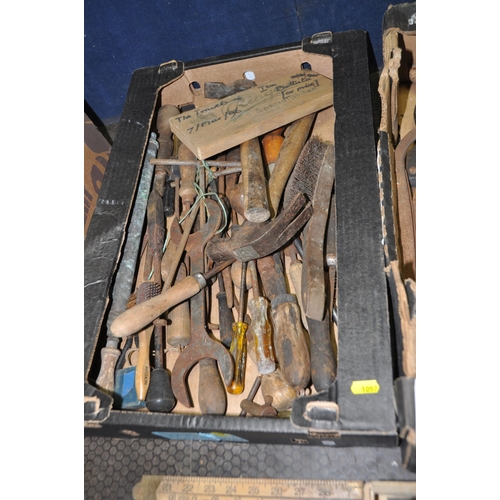 1057 - FOUR TRAYS CONTAINING VINTAGE TOOLS including thread gauges, tap holders, pick axe heads, secateurs,... 