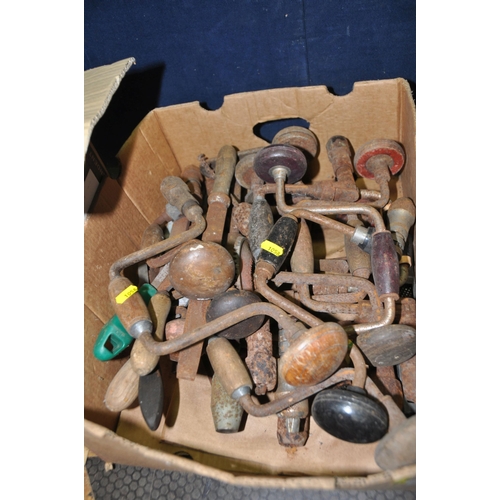 1058 - FOUR TRAYS CONTAINING VINTAGE TOOLS including saws, hand and shoulder braces, 3mm thick oak parquet ... 